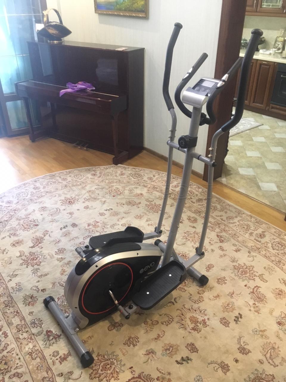 Тренажер tiger. Evo fitness эллиптический тренажер. Evo fitness эллиптический тренажер. Эллипс evo fitness jess. Дешевый эллипсоид stella eva fitness.